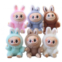 PELUCHE CON LLAVERO LABUBU CARA DE GOMA  MUEVE LA COLITA A CUERDA X16CM